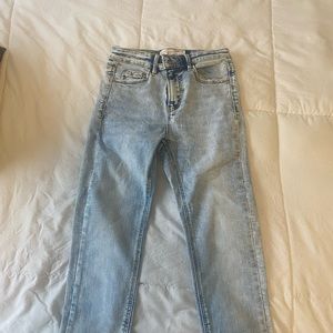 High rise woman skinny jeans light blue color